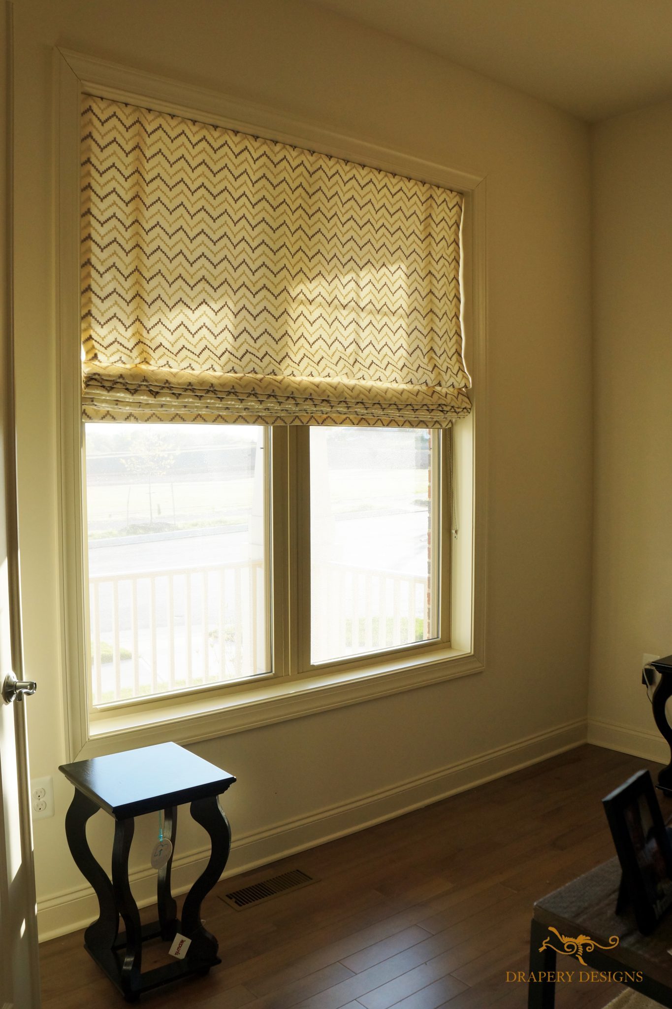 Lined flat roman shade with seams for a wide window at office