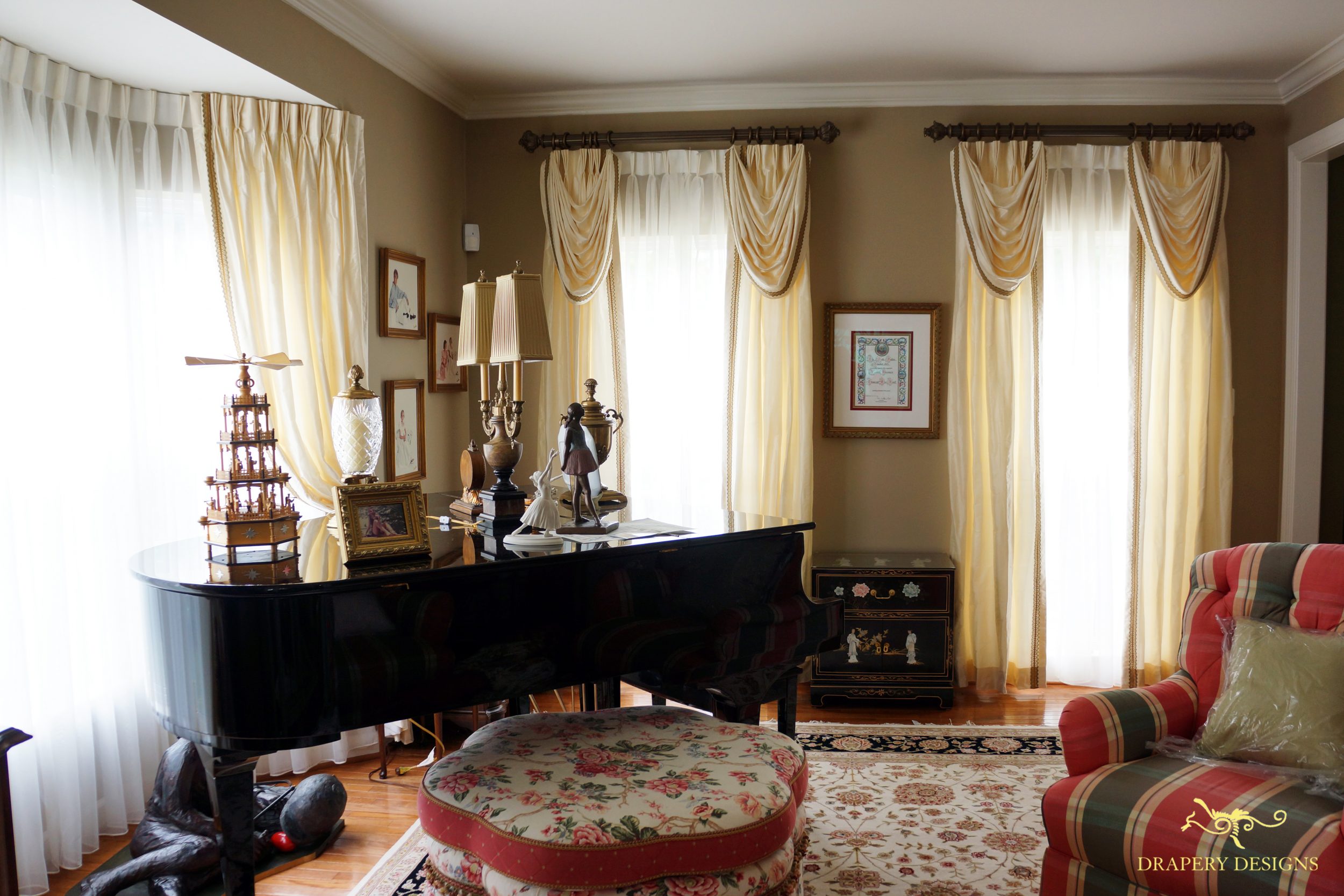 Interlined silk panels with classic swags and trim accent for formal room.