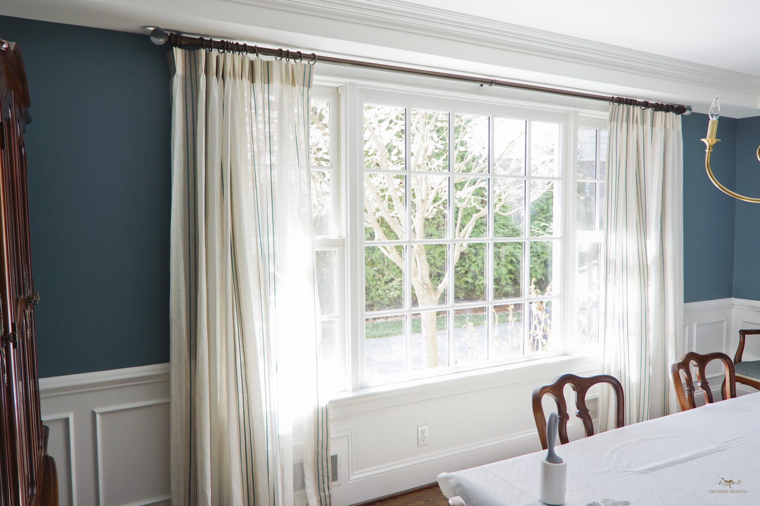Off white curtains in Dining Room