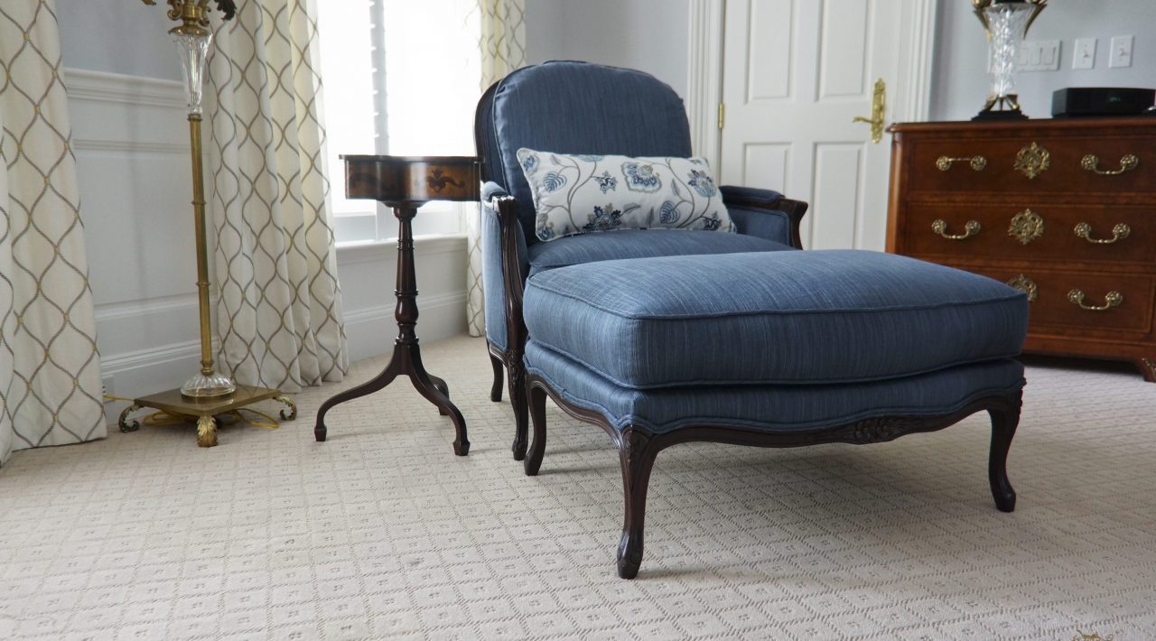 Custom upholstered armchair and ottoman 01