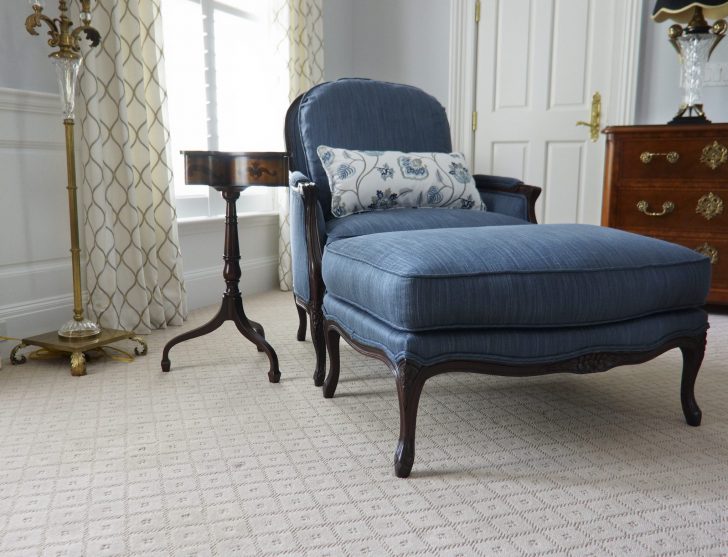 Custom upholstered armchair and ottoman 01