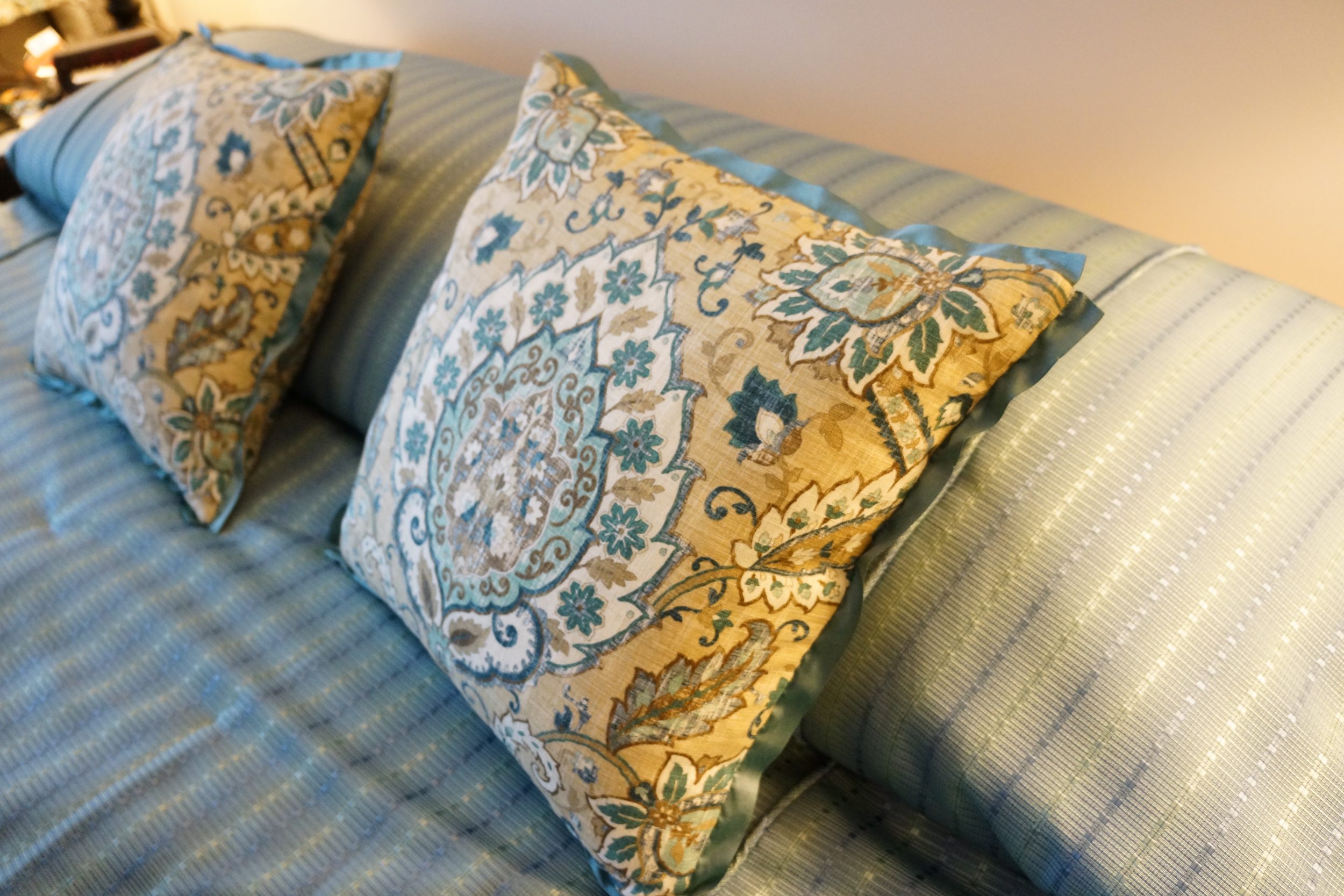 Turquoise pillows with accent Trim